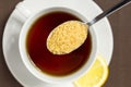 Brown sugar and a cup of tea Royalty Free Stock Photo