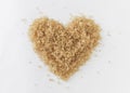 Brown sugar in heart shape Royalty Free Stock Photo