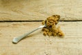Brown sugar on a silver teaspoon Royalty Free Stock Photo