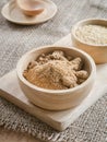 Brown sugar and wheat germ in wooden bowl Royalty Free Stock Photo