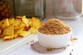 Brown sugar in white ceramic bowl.