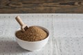 Brown sugar in white ceramic bowl on the table Royalty Free Stock Photo