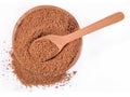 Brown sugar in a wooden bowl on a white Royalty Free Stock Photo