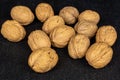 Brown tasty walnut on grey stone Royalty Free Stock Photo