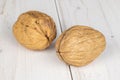 Brown tasty walnut on grey wood Royalty Free Stock Photo