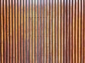 Brown teak wood texture background, Abstract seamless pattern of modern wall design paneling with vertical wooden stripe for the b