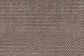 Brown textile background with checkered pattern, closeup. Structure of the fabric macro. Royalty Free Stock Photo