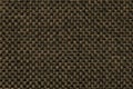 Brown textile background with checkered pattern, closeup. Structure of the fabric macro. Royalty Free Stock Photo