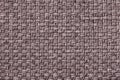 Brown textile background with checkered pattern, closeup. Structure of the fabric macro. Royalty Free Stock Photo