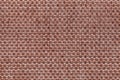 Brown textile background with checkered pattern, closeup. Structure of the fabric macro. Royalty Free Stock Photo