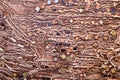 The brown texture of the concrete wall is made of decorative plaster with the addition of multi-colored gems, glass squares and ci Royalty Free Stock Photo