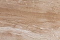 Brown travertine texture, expensive and precious natural stone background.