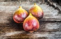 Brown turkey figs on teak wooden