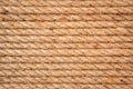 Brown twisted rope in aline. Brown and yellow rope textured background. Rope pattern for background.