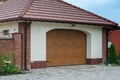 Brown vertical blinds entrance to the garage. Closed Roller Shut