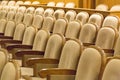 Brown vintage seats armchairs in theater. Theater or conference room interior. Royalty Free Stock Photo