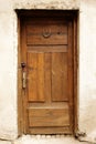 Brown vintage wooden door with horseshoe for luck