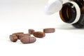 Brown vitamin tablets