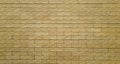 Brown wall and square pattern for background and wallpaper, Brick texture for construction. Royalty Free Stock Photo