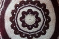 Brown and white circular crochet pattern