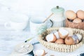 Brown and white eggshells placed in basket in home kitchen on table, eggshells stored for making natural fertilizers for growing v Royalty Free Stock Photo