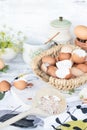 Brown and white eggshells placed in basket in home kitchen on table, eggshells stored for making natural fertilizers for growing v Royalty Free Stock Photo