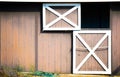 Brown and white open barn door Royalty Free Stock Photo