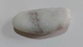 Brown and white pebble color in white background Royalty Free Stock Photo