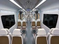 Brown white seats in the interior of a train wagon Royalty Free Stock Photo