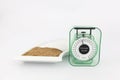 Brown and white sugar in a plate with a weight scale Royalty Free Stock Photo