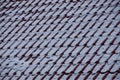 Brown white roof tile texture under the snow Royalty Free Stock Photo