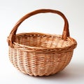 Brown wicker basket with one large handle. Wooden basket made of vines. Rattan basket