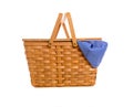 A brown wicker picnic basket on a white background with gingham cloth Royalty Free Stock Photo