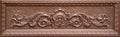 Brown wood carved panel with beautiful floral pattern Royalty Free Stock Photo