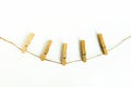 Brown wood clothespin, paper clip Royalty Free Stock Photo