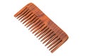 Brown wood comb on white background. Royalty Free Stock Photo