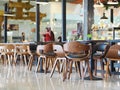 Brown wood curved chair sets crop closeup in a cafeteria coffee shop Royalty Free Stock Photo