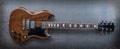 Brown electric guitar on metal background Royalty Free Stock Photo