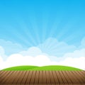 Brown wood floor with green field and blue sky background empty Royalty Free Stock Photo