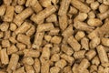 Brown wood pellets texture background. natural pile of wood pellets. organic biofuels. Alternative biofuel from sawdust. The cat