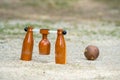 Brown woodball gate or finish line on sand ground floor.