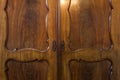 Brown wooden antique closet doors, oak luxury design Royalty Free Stock Photo