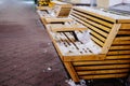 Brown wooden benches at christmas fair