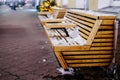 Brown wooden benches at christmas fair