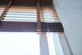 Brown wooden blinds in the interior close-up Royalty Free Stock Photo