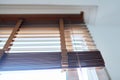 Brown wooden blinds in the interior close-up Royalty Free Stock Photo