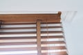 Brown wooden blinds in the interior close-up Royalty Free Stock Photo