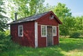 Brown wooden cabin in a forest