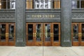 brown wooden doors with gold handles at the entrance Chicago Union Station in downtown Chicago Illinois