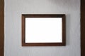 Brown wooden frame on gray concrete wall and have empty space la Royalty Free Stock Photo